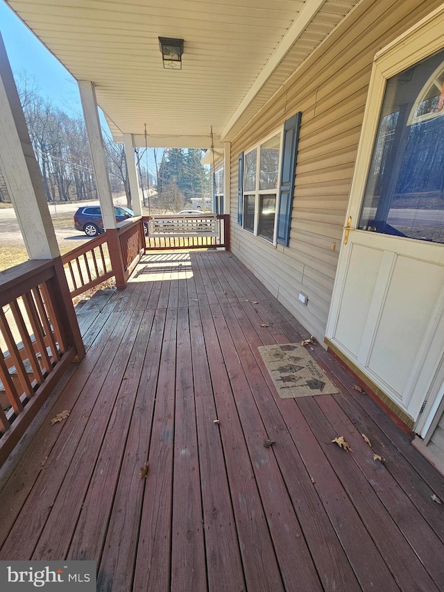 wooden deck with covered porch