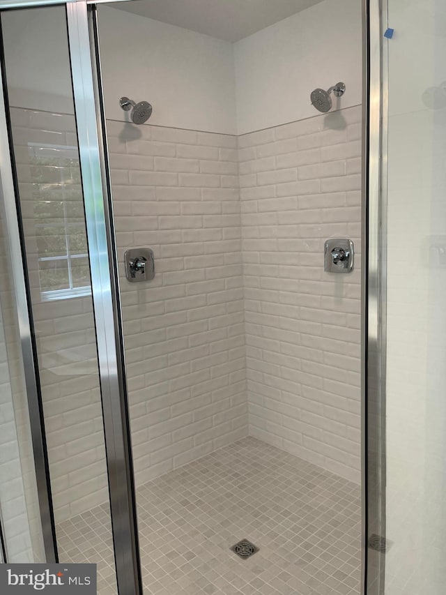 bathroom with a stall shower