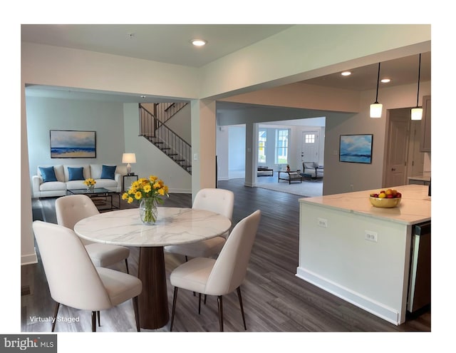 dining room featuring dark wood-style floors, stairway, recessed lighting, and baseboards