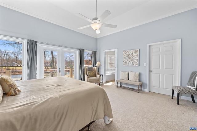 bedroom featuring access to outside, multiple windows, light carpet, and ornamental molding