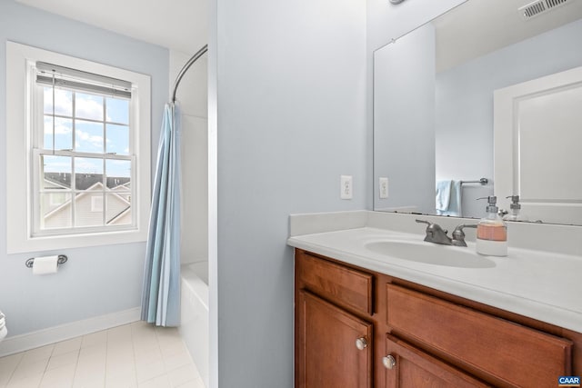 bathroom with vanity, shower / bathtub combination with curtain, baseboards, visible vents, and toilet