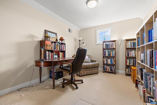 carpeted office space with visible vents and baseboards