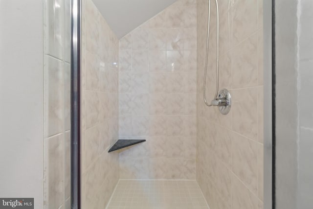 full bath featuring a shower stall