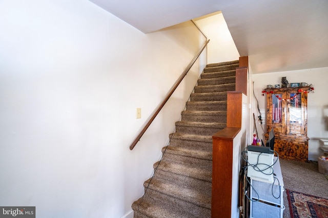 stairs with carpet floors