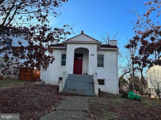 view of front of home featuring stucco siding