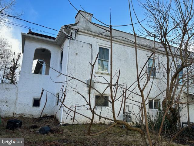 6218 61st Pl, Riverdale, MD 20737 - view of property exterior with stucco siding