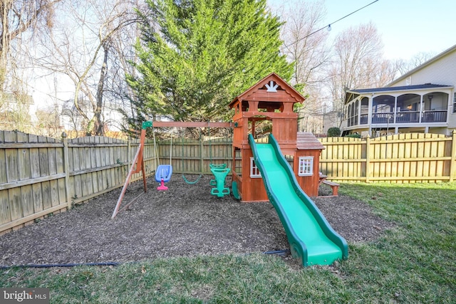 view of play area with a fenced backyard