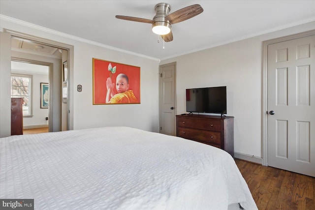 bedroom with a ceiling fan, wood finished floors, and ornamental molding