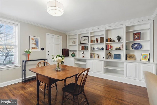 dining space featuring crown molding, dark wood-style floors, and baseboards