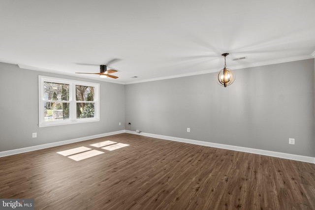 unfurnished room with ceiling fan with notable chandelier, baseboards, dark wood-style flooring, and ornamental molding