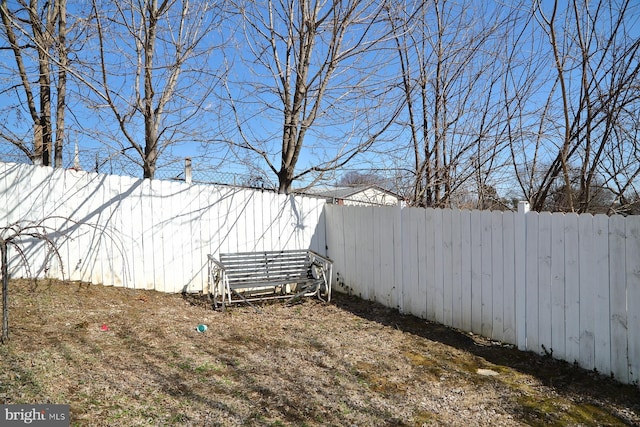 view of yard featuring a fenced backyard