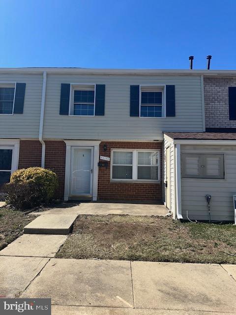 multi unit property featuring brick siding