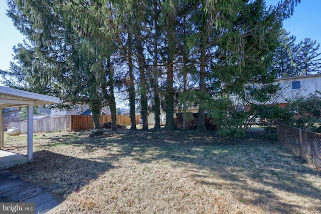 view of yard featuring fence