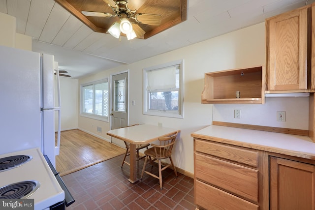 kitchen featuring white appliances, a ceiling fan, baseboards, open shelves, and brick floor