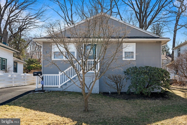 exterior space with a front lawn