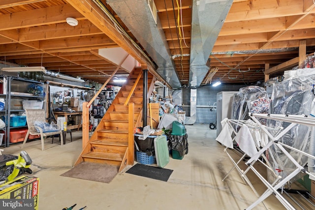 unfinished basement with stairs