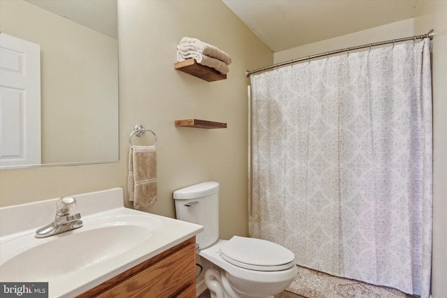 bathroom with a shower with shower curtain, toilet, and vanity