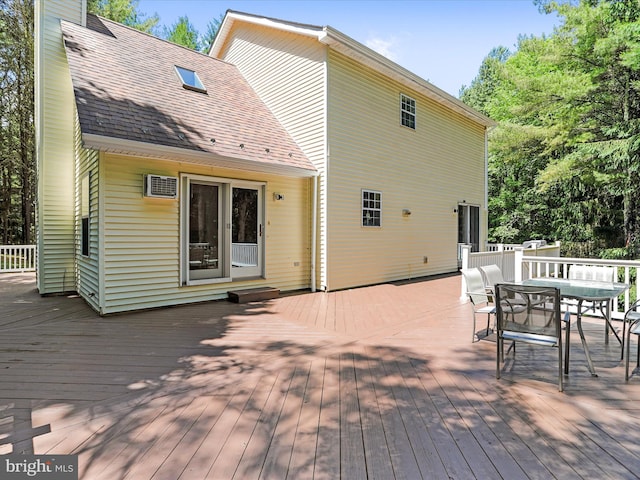 wooden deck with outdoor dining area