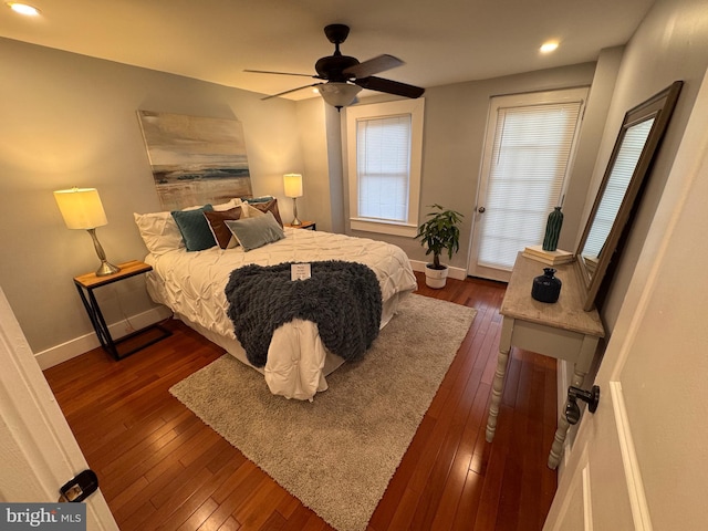 bedroom with dark wood-type flooring, recessed lighting, baseboards, and ceiling fan