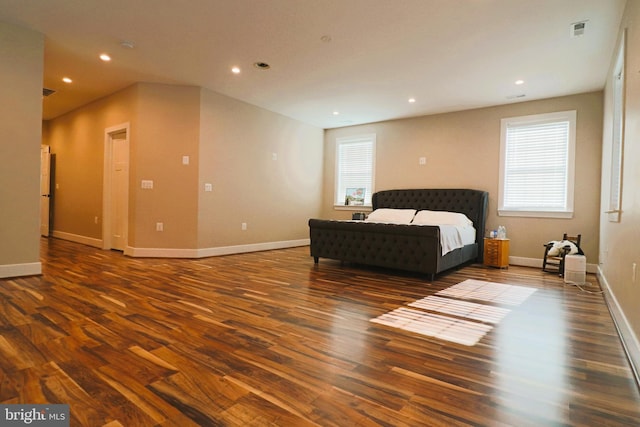 bedroom featuring recessed lighting, visible vents, multiple windows, and wood finished floors