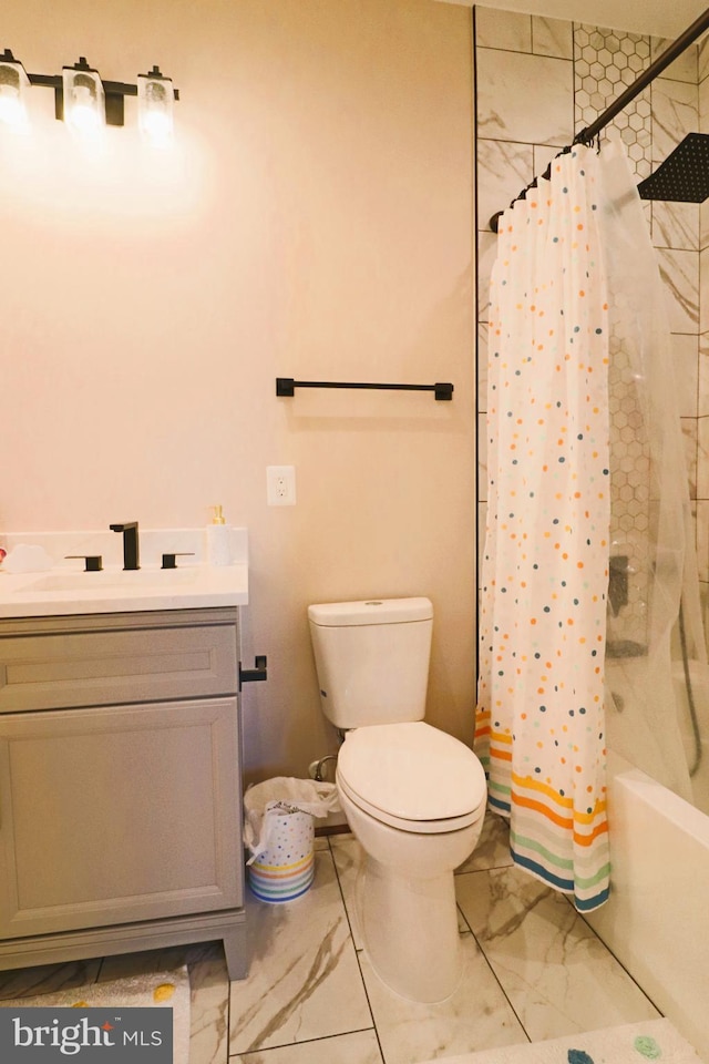 full bathroom featuring vanity, shower / tub combo, toilet, and marble finish floor