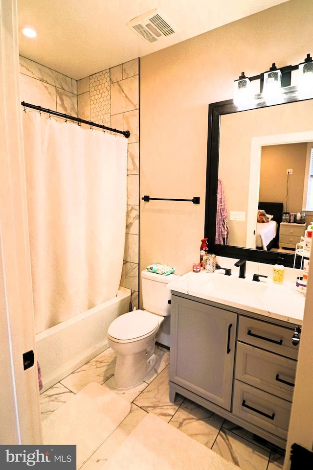 ensuite bathroom with visible vents, shower / bathtub combination with curtain, toilet, marble finish floor, and vanity