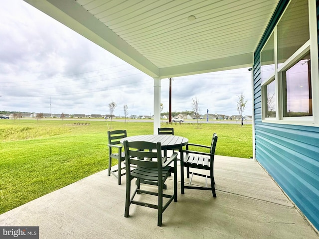 view of patio / terrace featuring outdoor dining space