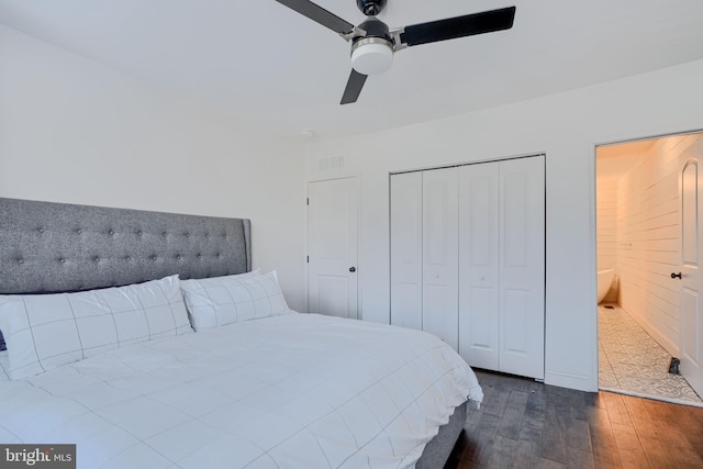 bedroom with ceiling fan, a closet, visible vents, and dark wood-style floors