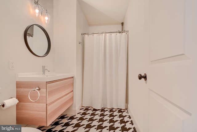 bathroom with tile patterned floors, vanity, and a shower with shower curtain