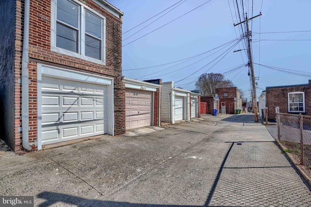 garage featuring fence