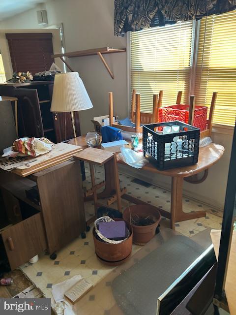 dining area with vaulted ceiling