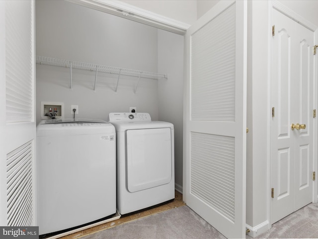 325 Quinton Oaks Cir, Stephens City, VA 22655 - laundry room featuring independent washer and dryer and light colored carpet