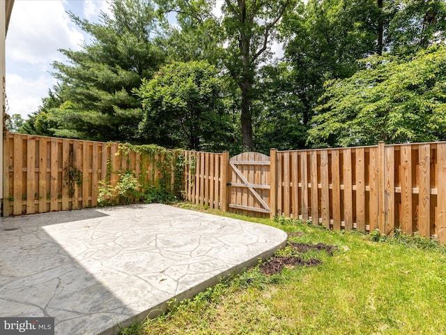 325 Quinton Oaks Cir, Stephens City, VA 22655 - fenced yard featuring a gate and a patio