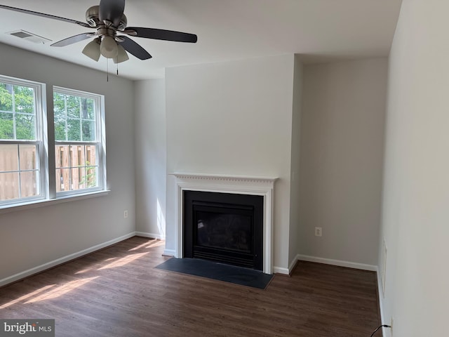 325 Quinton Oaks Cir, Stephens City, VA 22655 - unfurnished living room with wood finished floors, a ceiling fan, and a fireplace with flush hearth