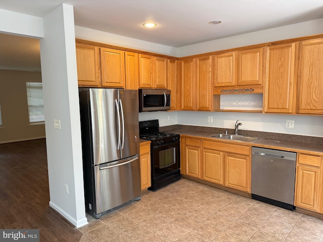 325 Quinton Oaks Cir, Stephens City, VA 22655 - kitchen with appliances with stainless steel finishes, dark countertops, open shelves, recessed lighting, and brown cabinetry