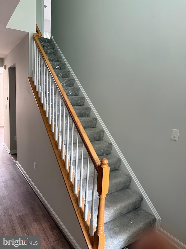 325 Quinton Oaks Cir, Stephens City, VA 22655 - staircase with wood finished floors and baseboards