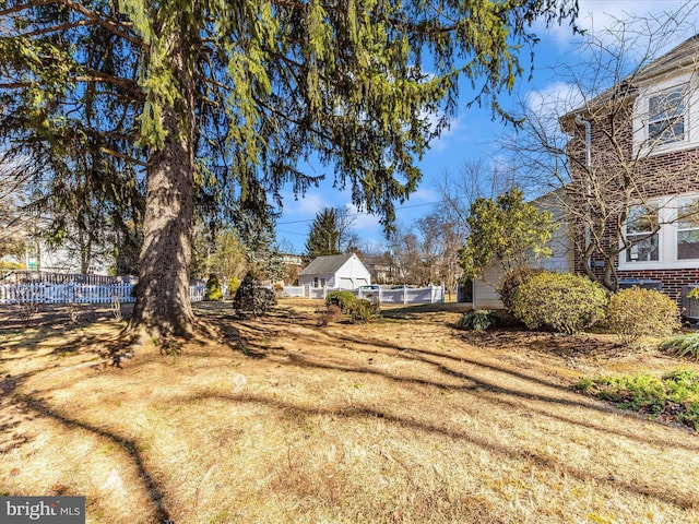 view of yard with fence