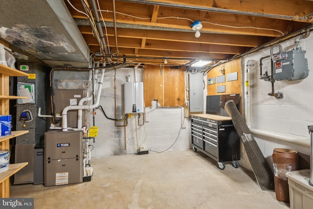 unfinished basement with water heater and heating unit