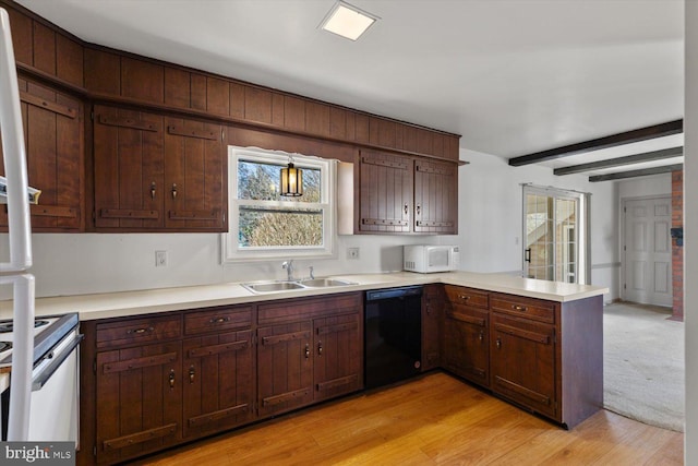 kitchen with white microwave, dishwasher, a peninsula, electric stove, and a sink