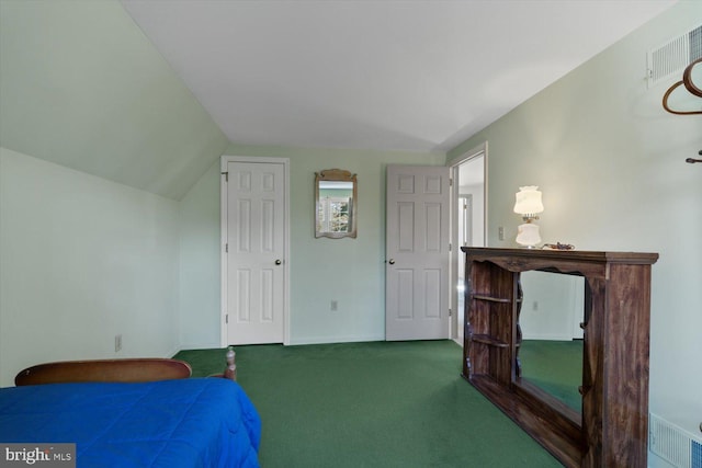 bedroom featuring lofted ceiling, baseboards, visible vents, and carpet floors