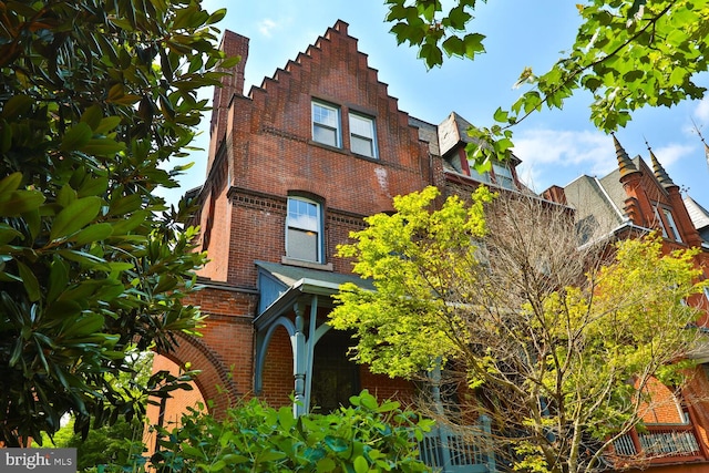 view of front of property with brick siding