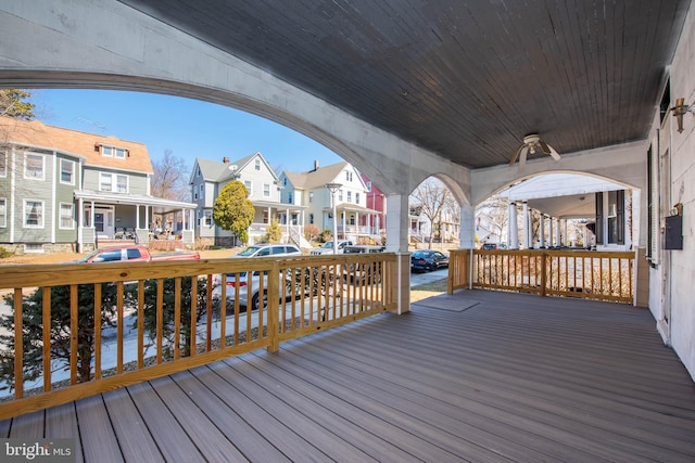 wooden terrace featuring a residential view