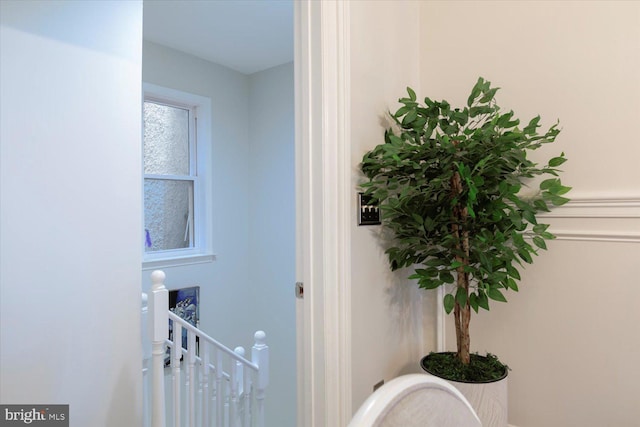 interior space featuring an upstairs landing