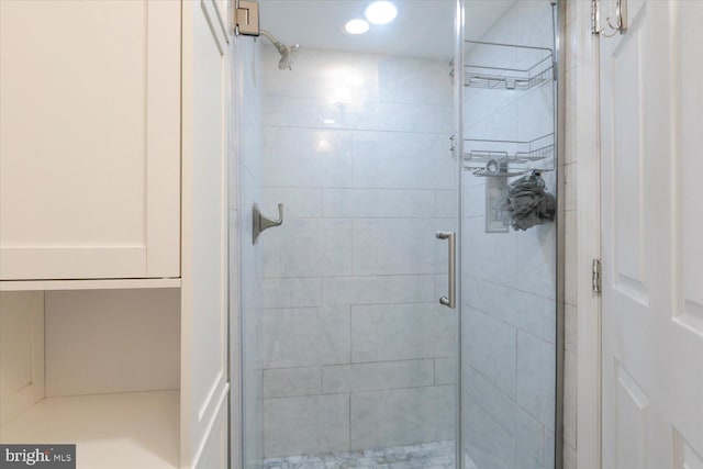 full bathroom featuring a shower stall