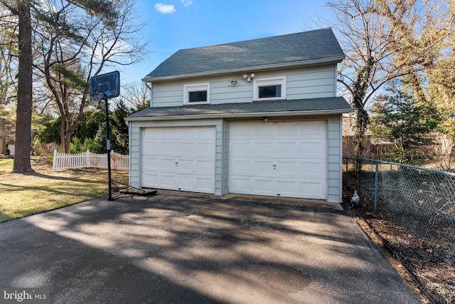 detached garage with fence