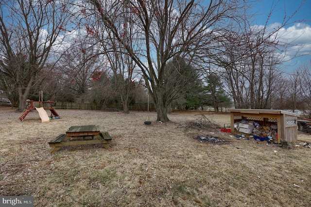 view of yard featuring a playground