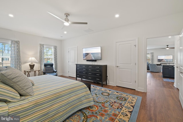 bedroom with recessed lighting, baseboards, ceiling fan, and dark wood-style flooring