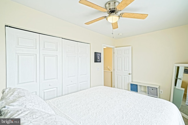 bedroom featuring a closet and ceiling fan