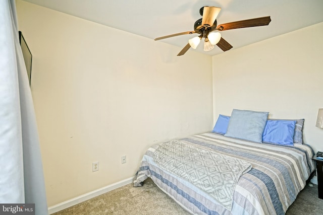 bedroom featuring carpet flooring, ceiling fan, and baseboards