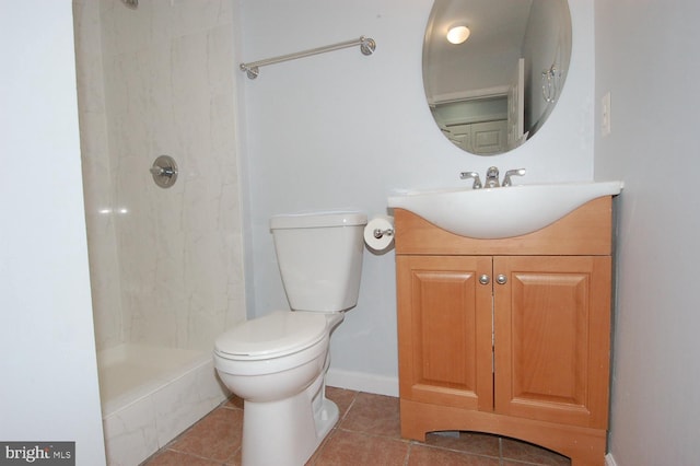 full bathroom with tile patterned flooring, toilet, and walk in shower